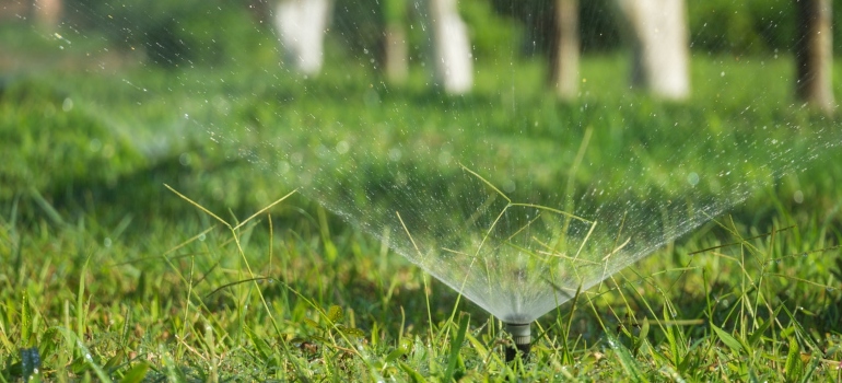 A close up of a working sprinkler.