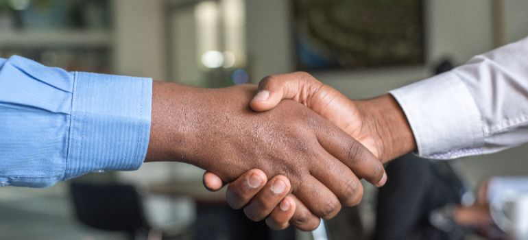 two people shaking hands