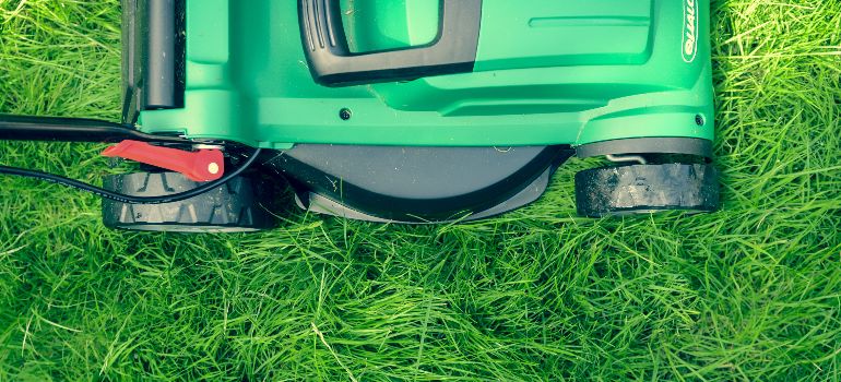 lawnmower going over grass