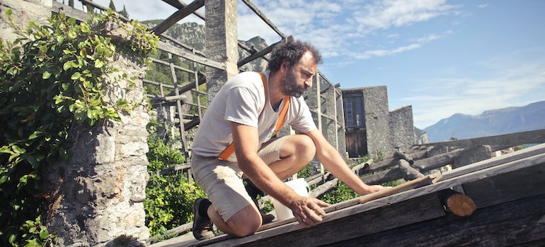 A person fixing roof