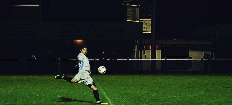 A football player on artificial turf