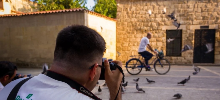 photographer taking picture of a man