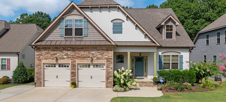 A well-taken-care-of house in spring - the best time of the year for roof cleaning